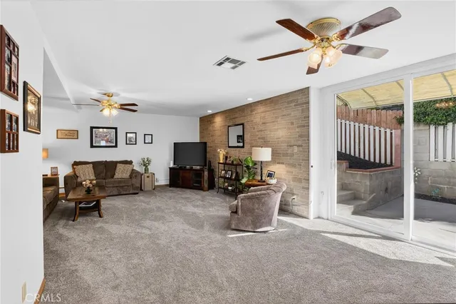 a bedroom with a bed and a table