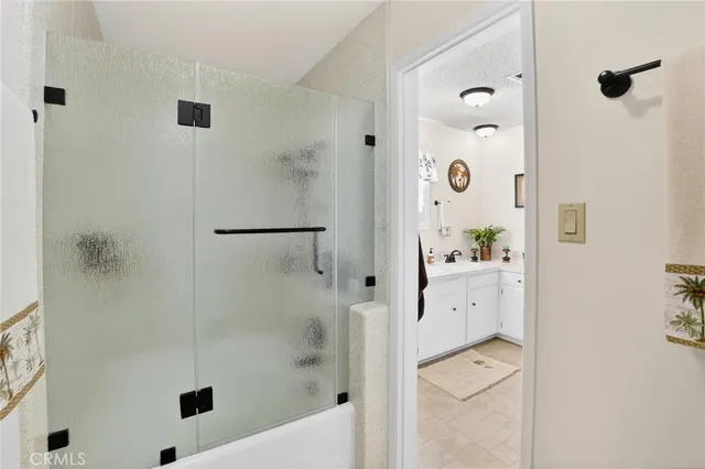 an aerial view of a house with outdoor space