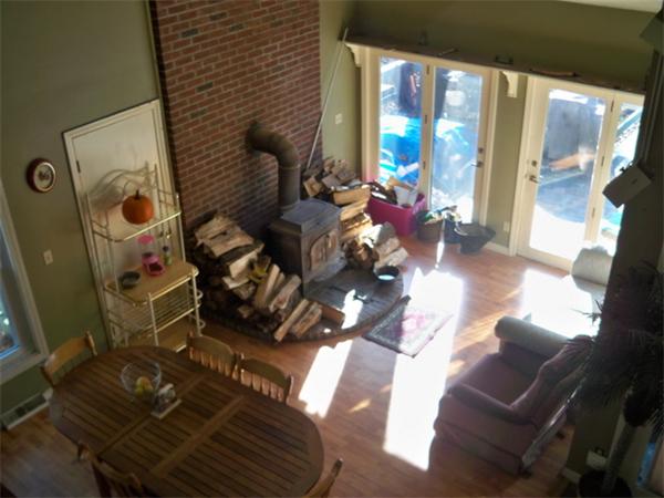 53 Scotland Road Newbury, MA 01951 - Photo 3 of 5 a living room with furniture and a floor to ceiling window