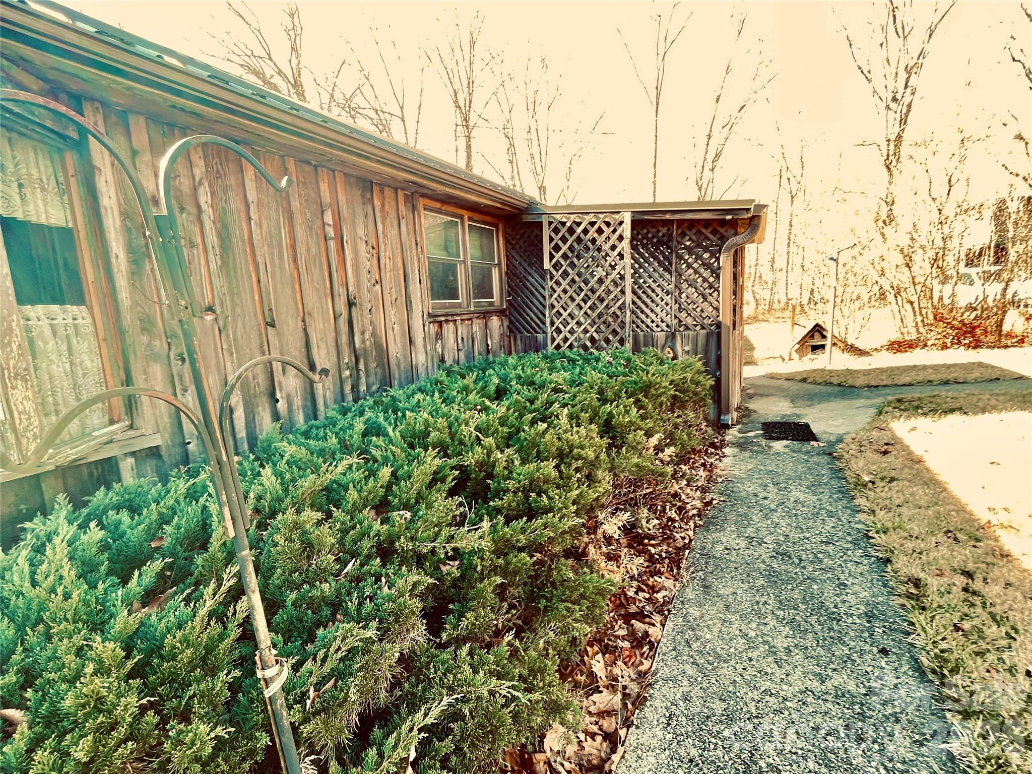 29 Cook Town Road Bakersville, NC 28705 - Photo 4 of 14 a view of a backyard with pathway