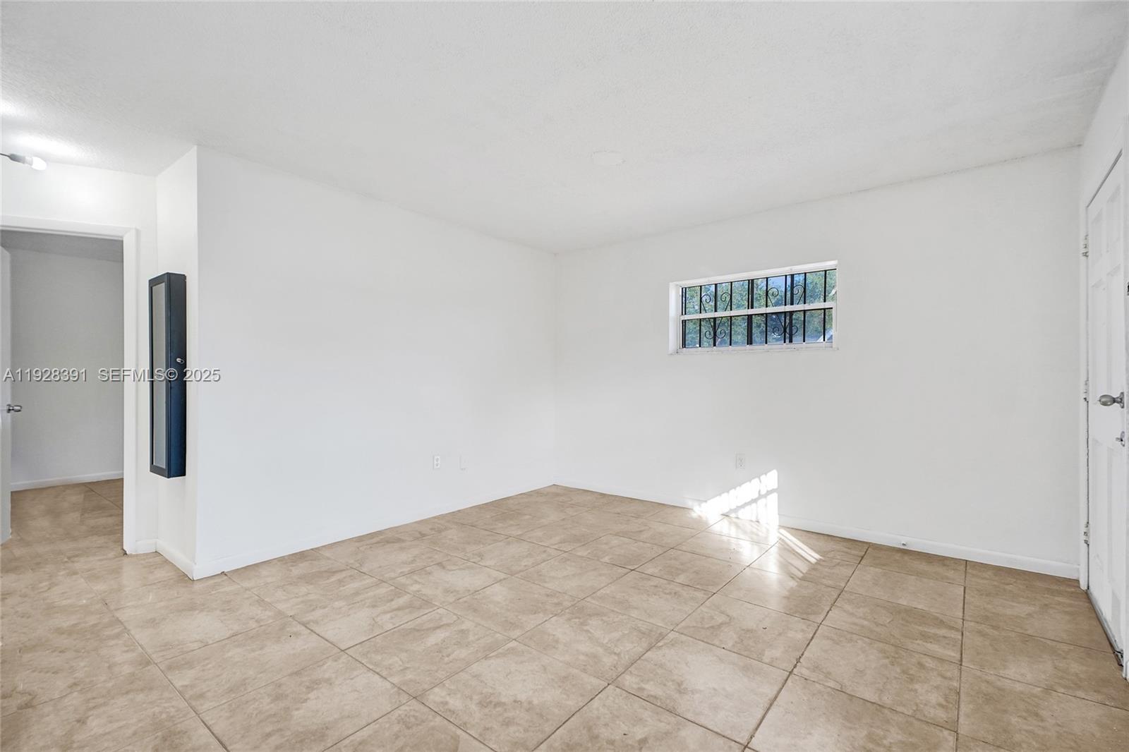 2907 Northwest 103rd Street, Unit 1 Miami, FL 33147 - Photo 9 of 38 a view of empty room