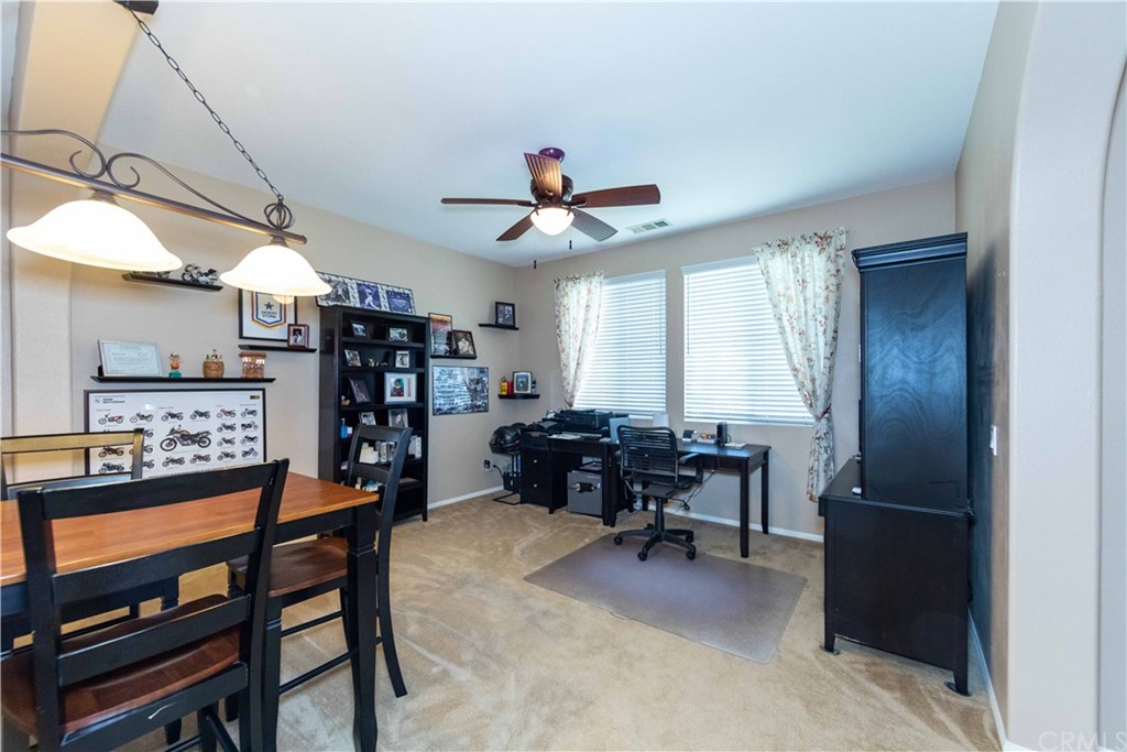 31271 Ensemble Drive Menifee, CA 92584 - Photo 11 of 30 a dining room with furniture and window