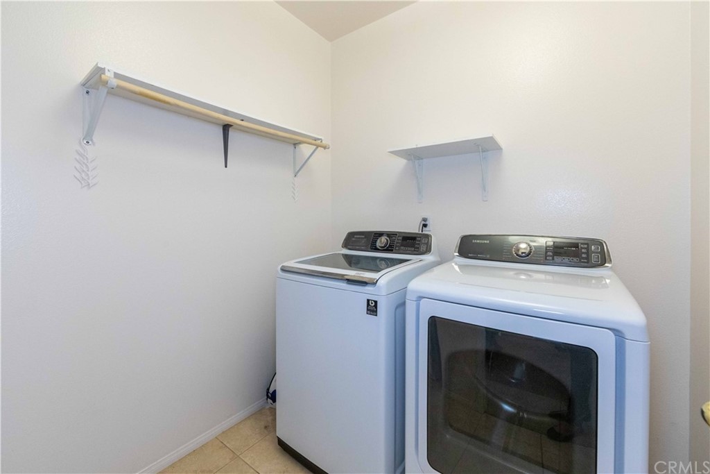 31271 Ensemble Drive Menifee, CA 92584 - Photo 22 of 30 a view of washer and dryer