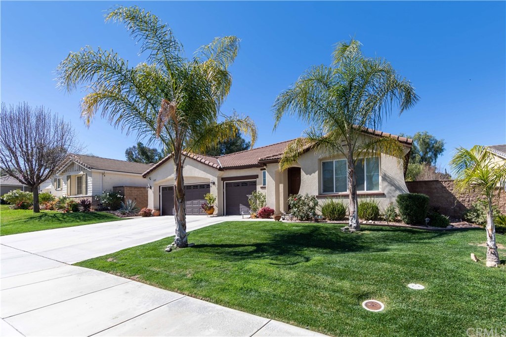 31271 Ensemble Drive Menifee, CA 92584 - Photo 23 of 30 front view of house with a yard