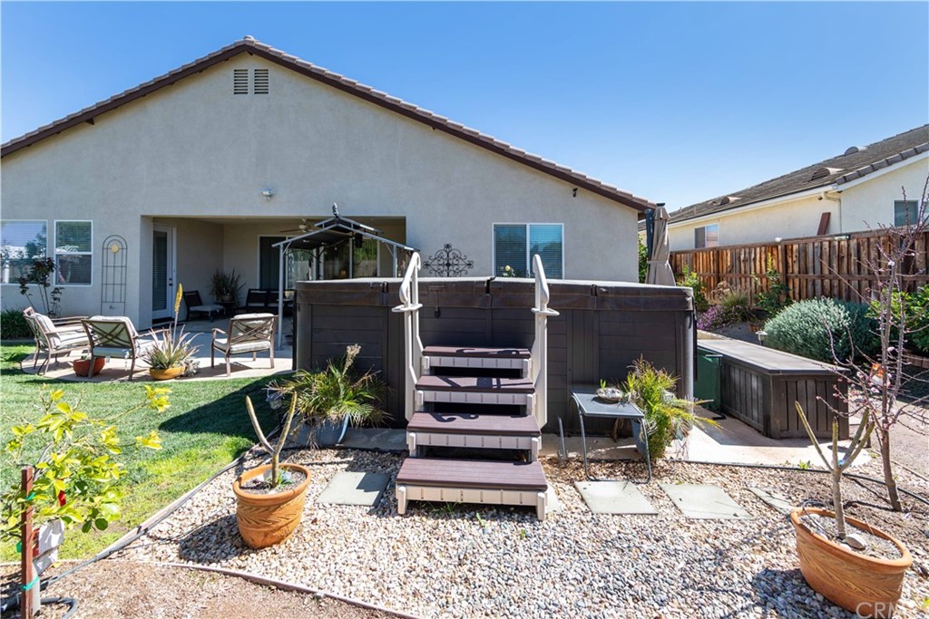 31271 Ensemble Drive Menifee, CA 92584 - Photo 24 of 30 a front view of a house with outdoor seating