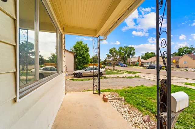 a view of a swimming pool with a patio