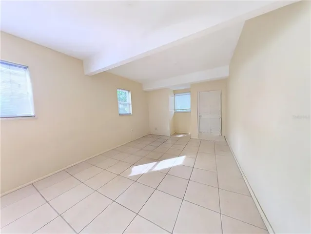 a view of an empty room with window