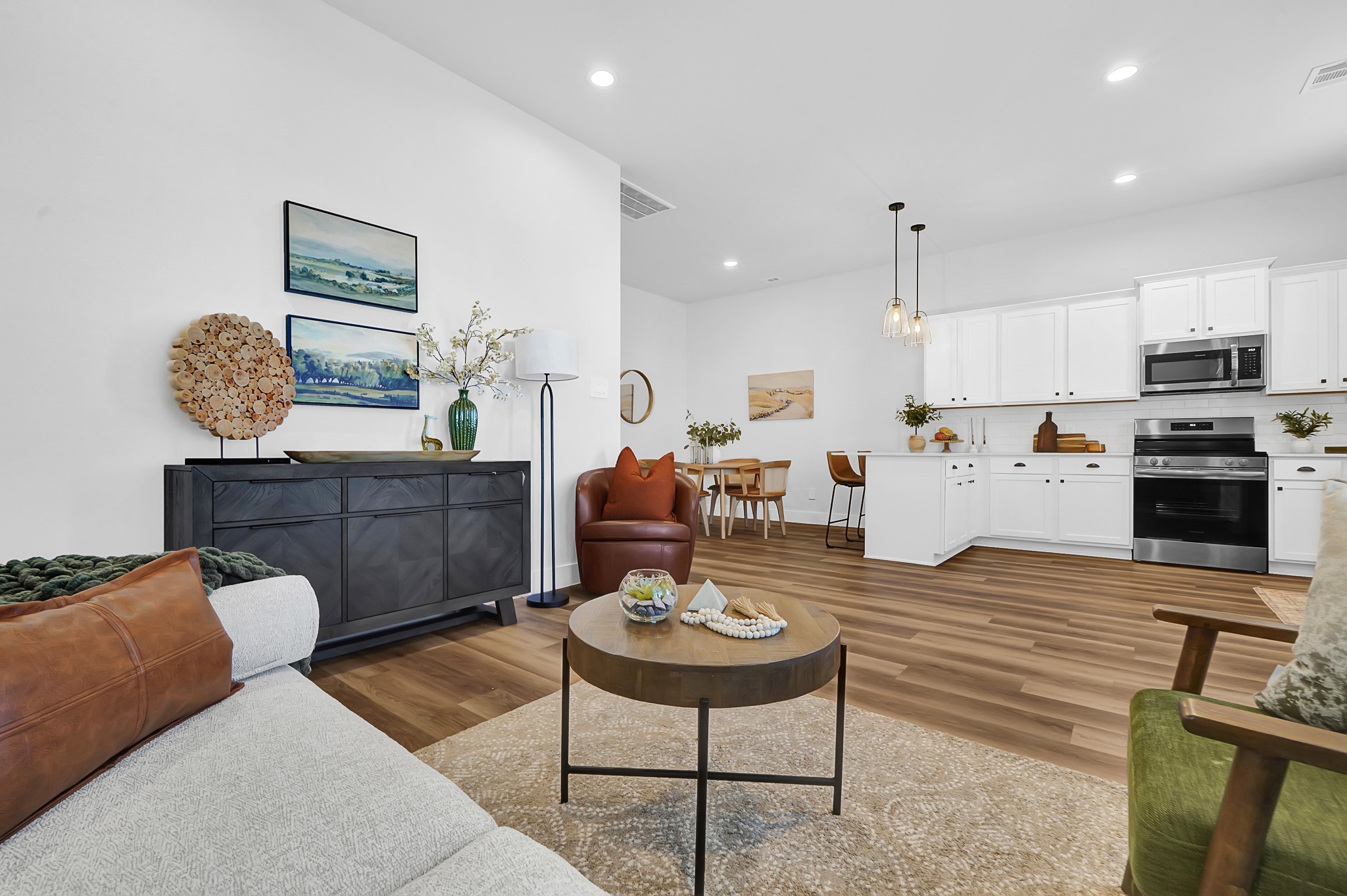 38634 Spur 149 Road, Unit 46B Magnolia, TX 77354 - Photo 48 of 48 GORGEOUS OPEN FLOOR PLAN! LIVING ROOM VIEW & TWO OPTIONS FOR THE WOOD LAMINATE FLOORING!