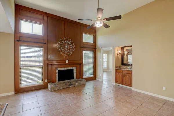 a view of a kitchen with a stove cabinets and a kitchen view