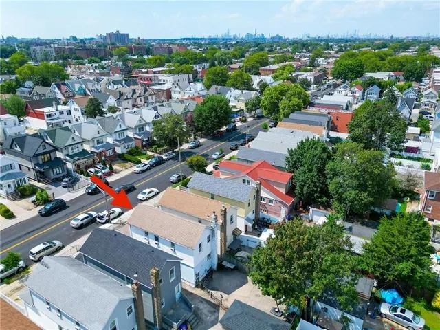 an aerial view of a city with lots of residential buildings