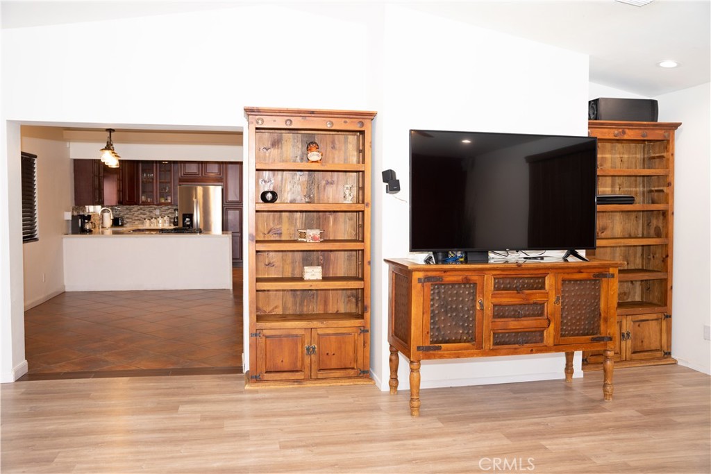 13655 El Rio Lane Desert Hot Springs, CA 92240 - Photo 11 of 27 a view of living room with furniture and flat screen tv