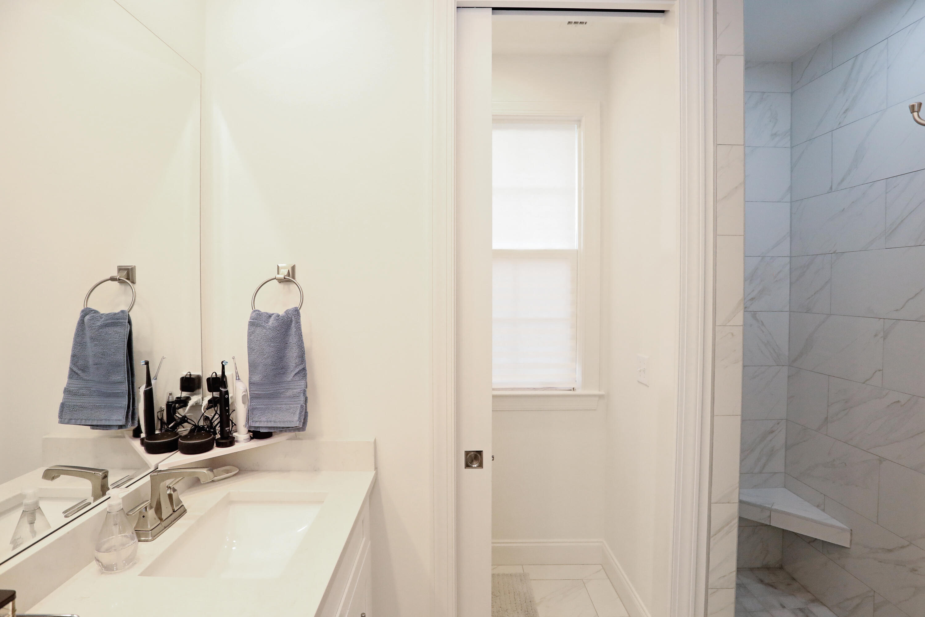 284 Windrow Way Inlet Beach Inlet Beach, FL 32461 - Photo 16 of 41 a bathroom with a sink and a mirror