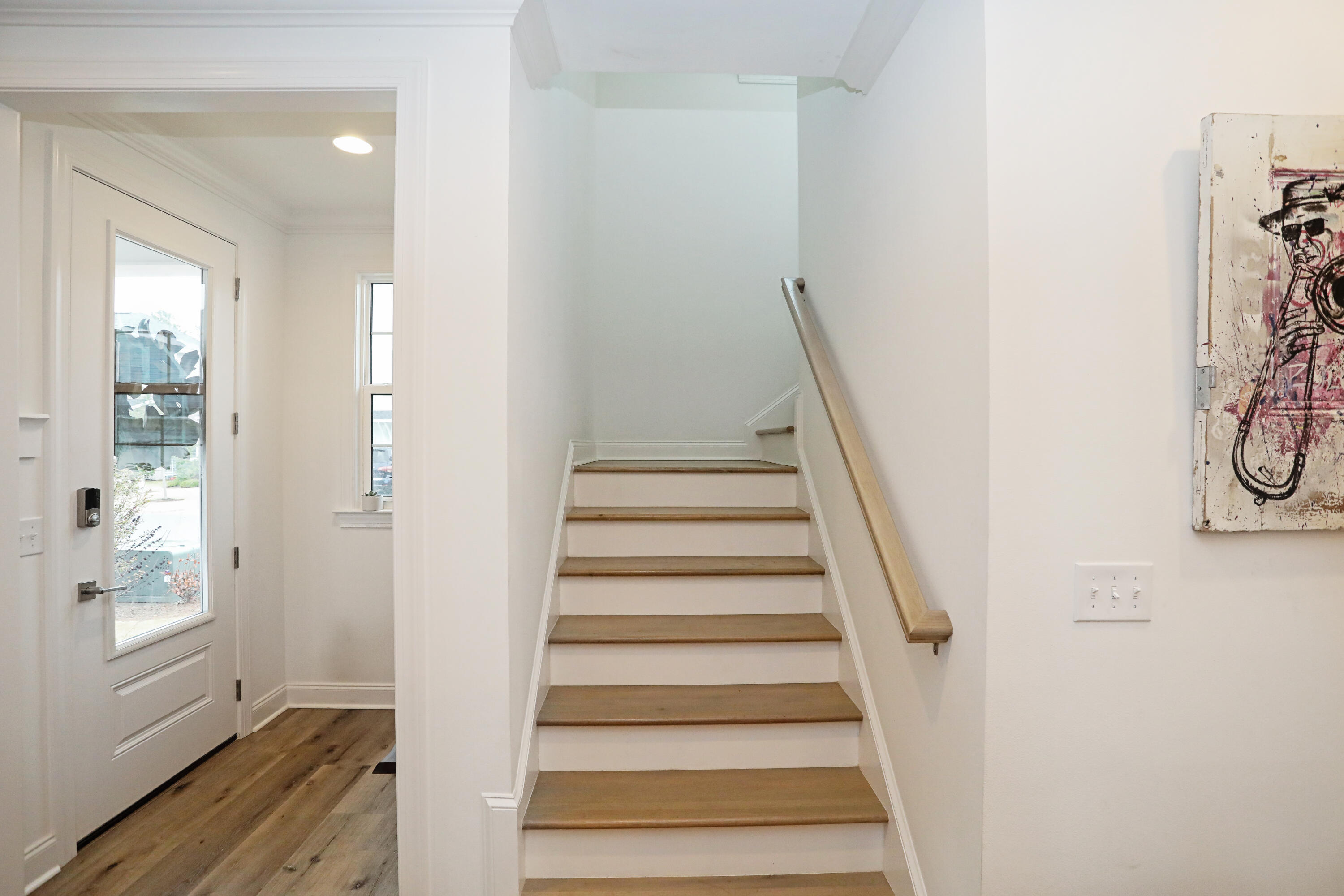 284 Windrow Way Inlet Beach Inlet Beach, FL 32461 - Photo 22 of 41 a view of entryway with wooden floor and stairs