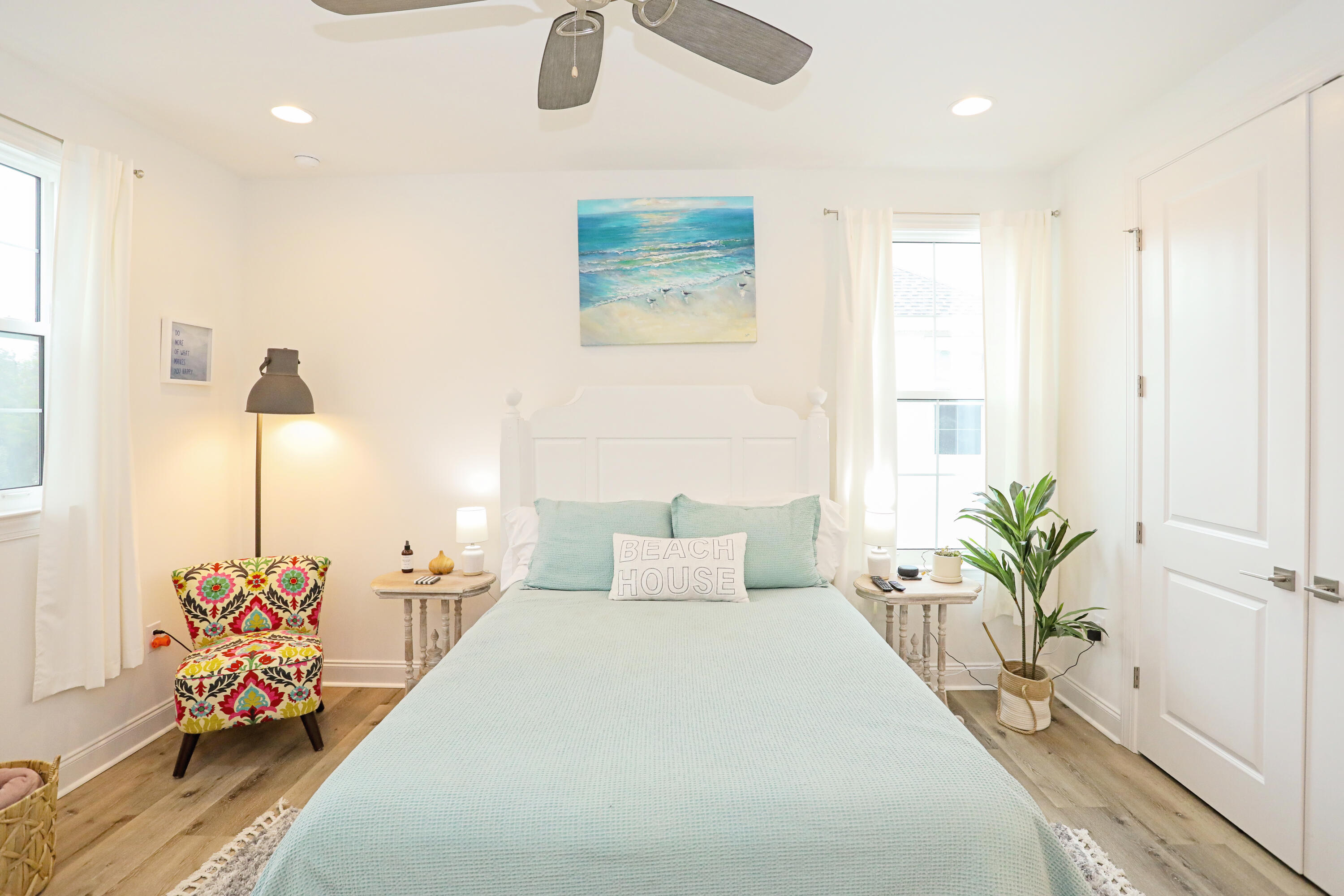 284 Windrow Way Inlet Beach Inlet Beach, FL 32461 - Photo 27 of 41 a bedroom with a bed a chandelier and potted plant