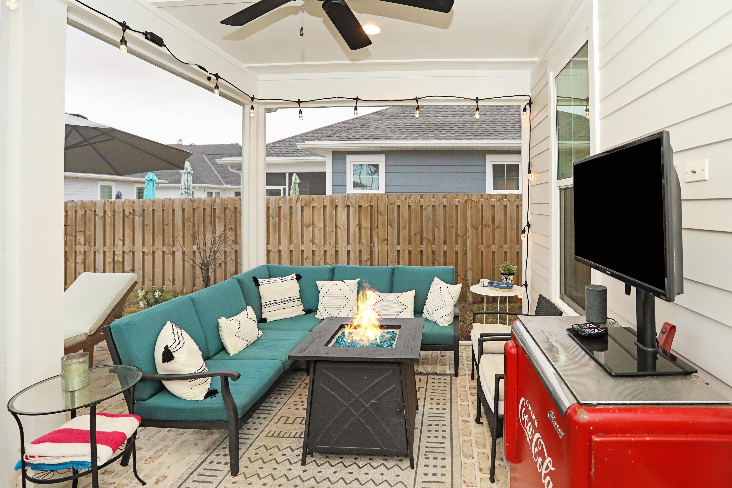 284 Windrow Way Inlet Beach Inlet Beach, FL 32461 - Photo 34 of 41 a outdoor living space with furniture and a flat screen tv