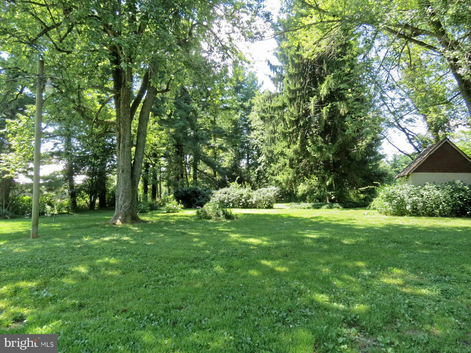675 Ridge Road Mount Airy, MD 21771 - Photo 8 of 20 a view of a grassy field with trees