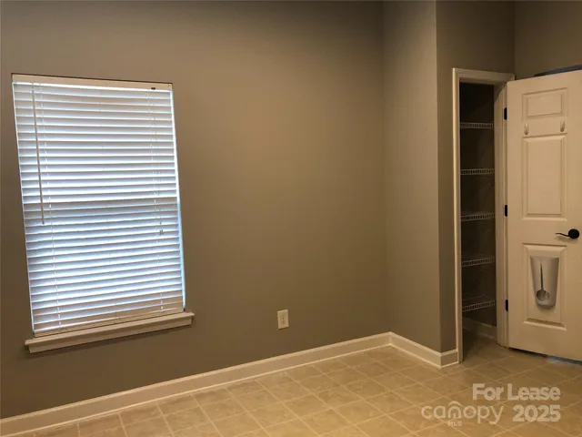 a view of a room that has a window