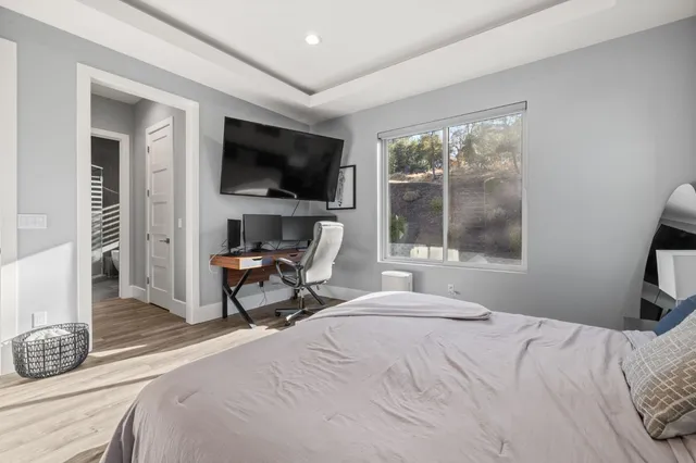 a kitchen with a sink and a refrigerator