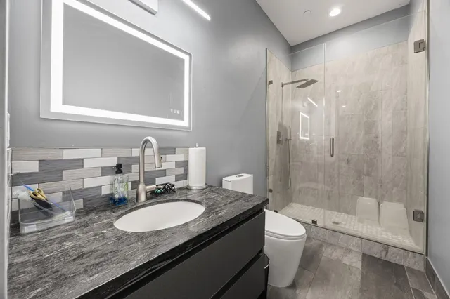 a view of a pathway both side of house