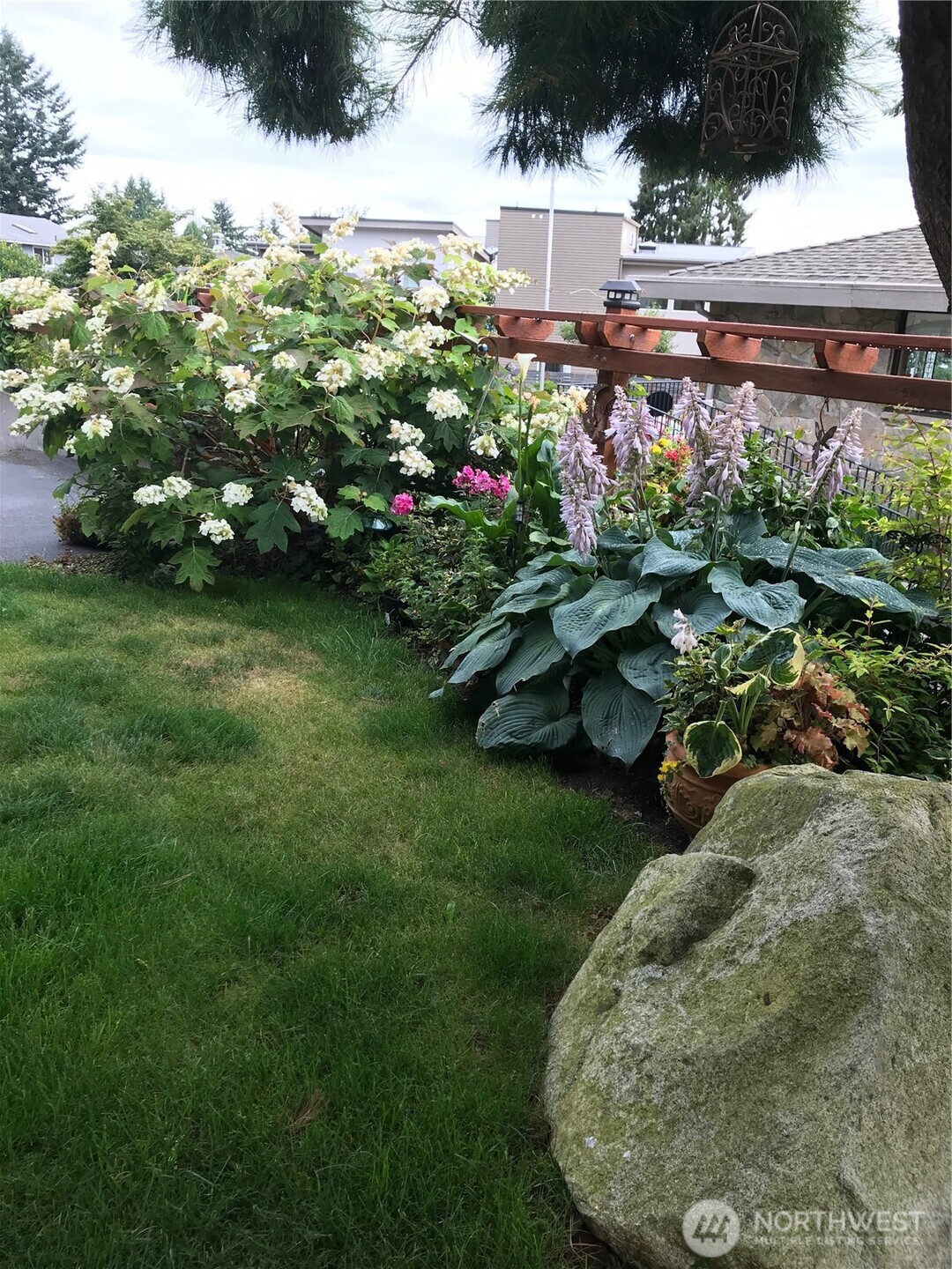 4322 29th Avenue West Seattle, WA 98199 - Photo 36 of 39 a view of a backyard with plants