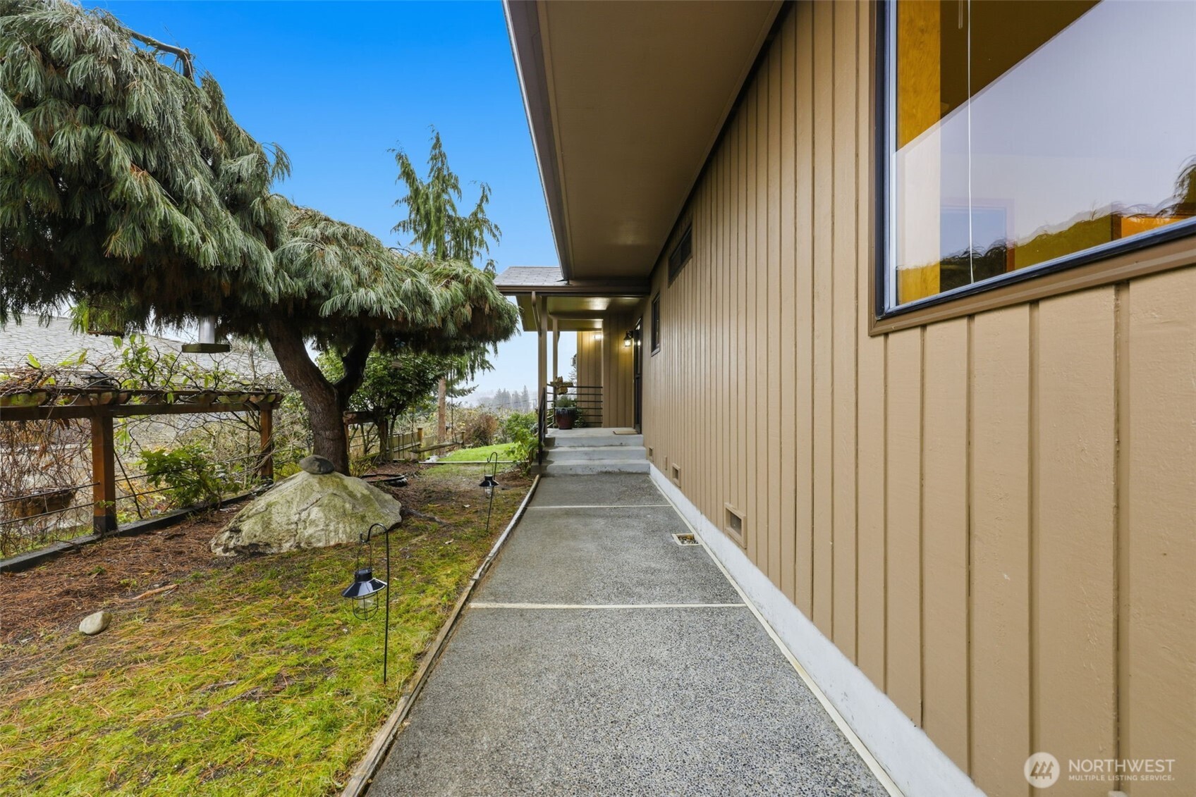 4322 29th Avenue West Seattle, WA 98199 - Photo 37 of 39 a view of a pathway of a house