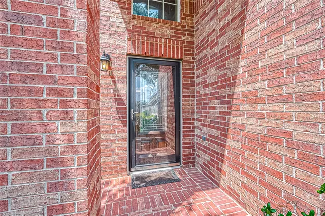a view of a brick buildings with an outdoor space