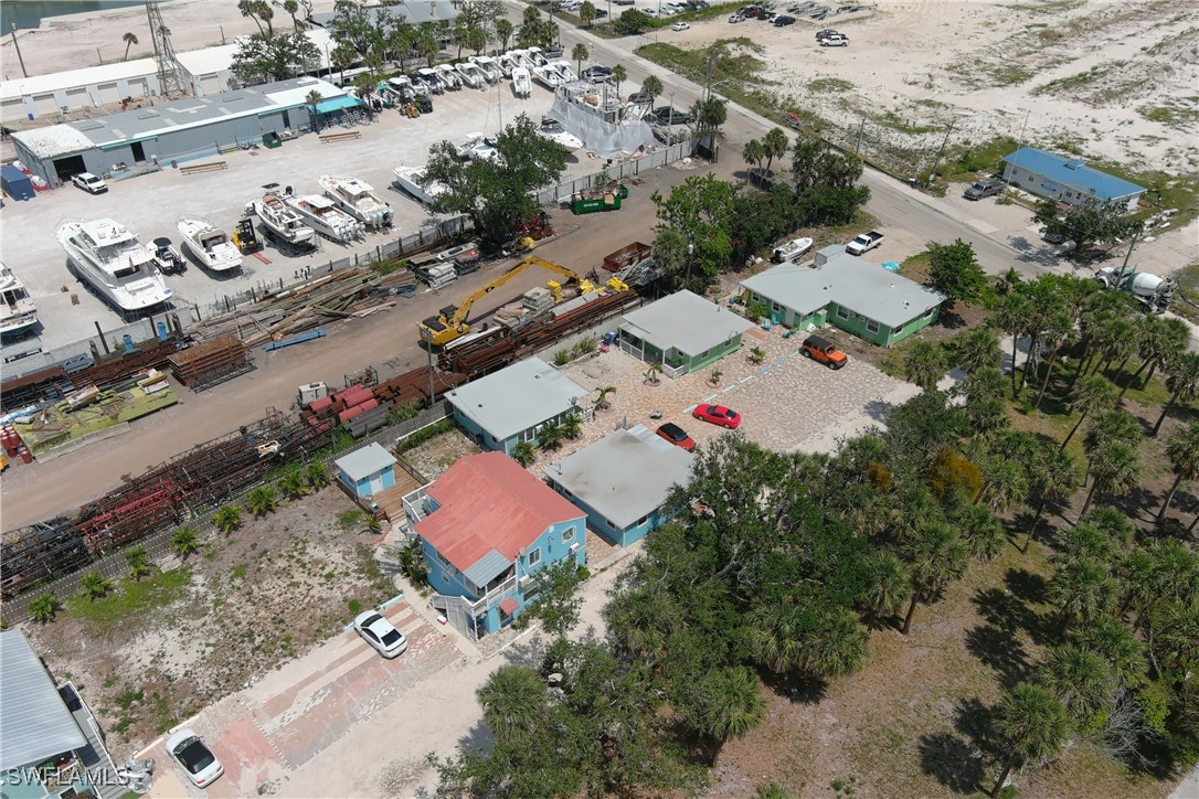 1180 Main Street, Unit 6 Fort Myers Beach, FL 33931 - Photo 16 of 18 an aerial view of residential house with outdoor space