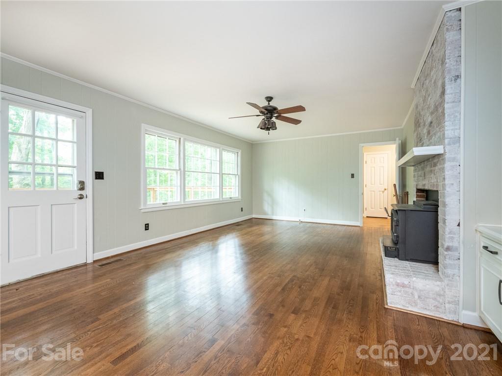 925 Reverdy Lane Matthews, NC 28105 - Photo 14 of 36 a view of empty room with wooden floor and fan