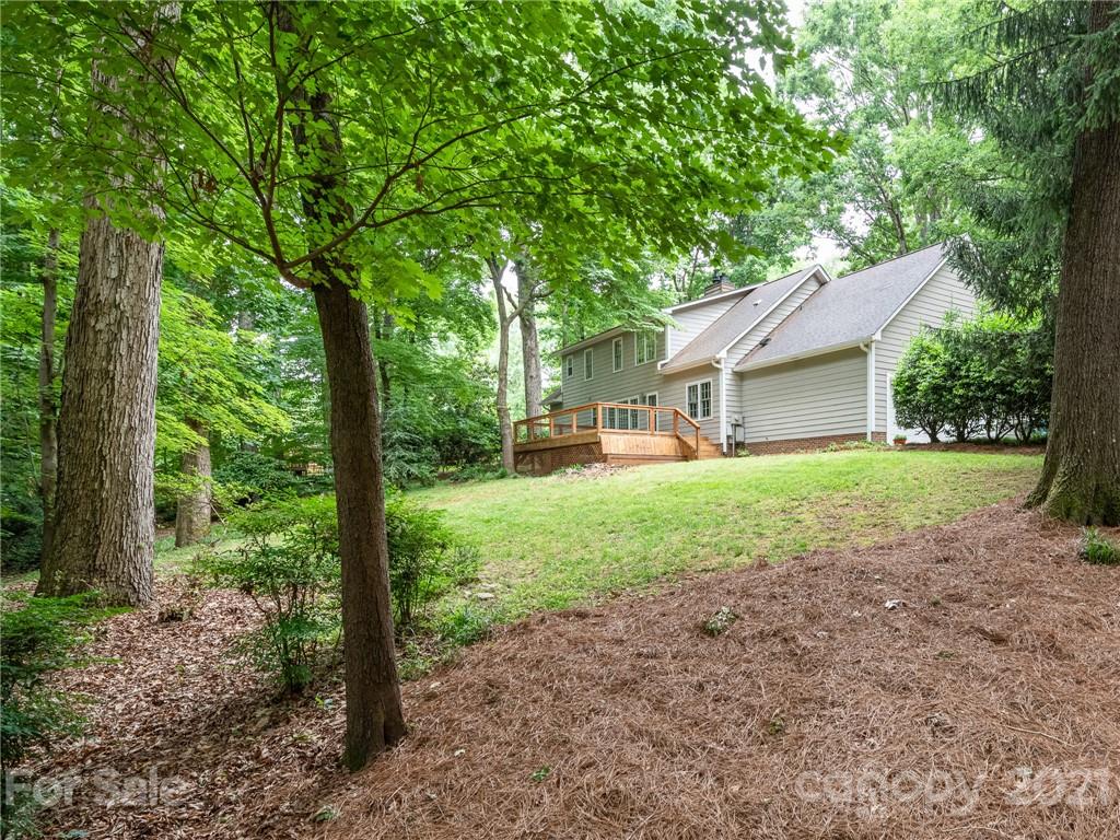 925 Reverdy Lane Matthews, NC 28105 - Photo 34 of 36 a house view with a backyard space