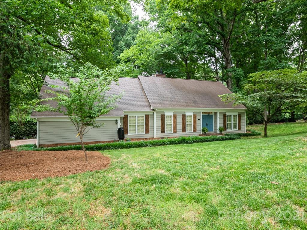 925 Reverdy Lane Matthews, NC 28105 - Photo 36 of 36 a house that has a big yard with large trees