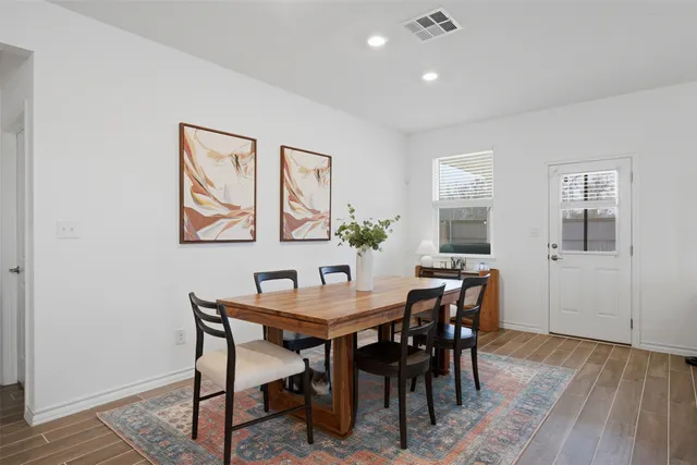 a view of a dining room with furniture