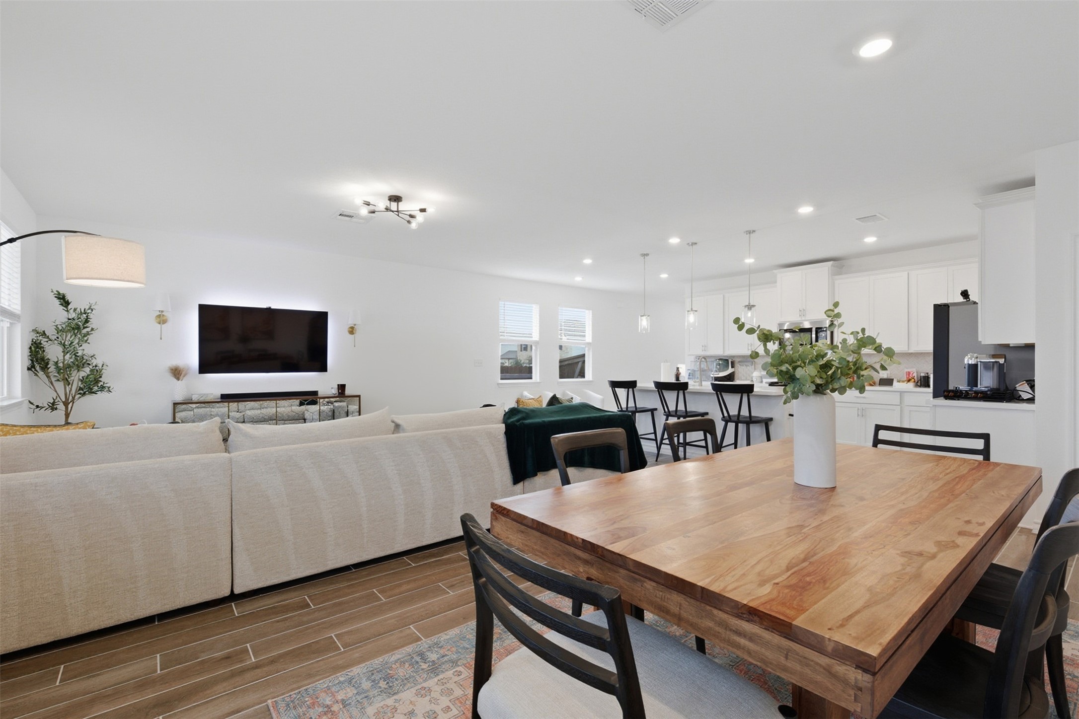 203 Stinchcomb Road Hutto, TX 78634 - Photo 10 of 30 Dining room with wood tiled floors and recessed lighting