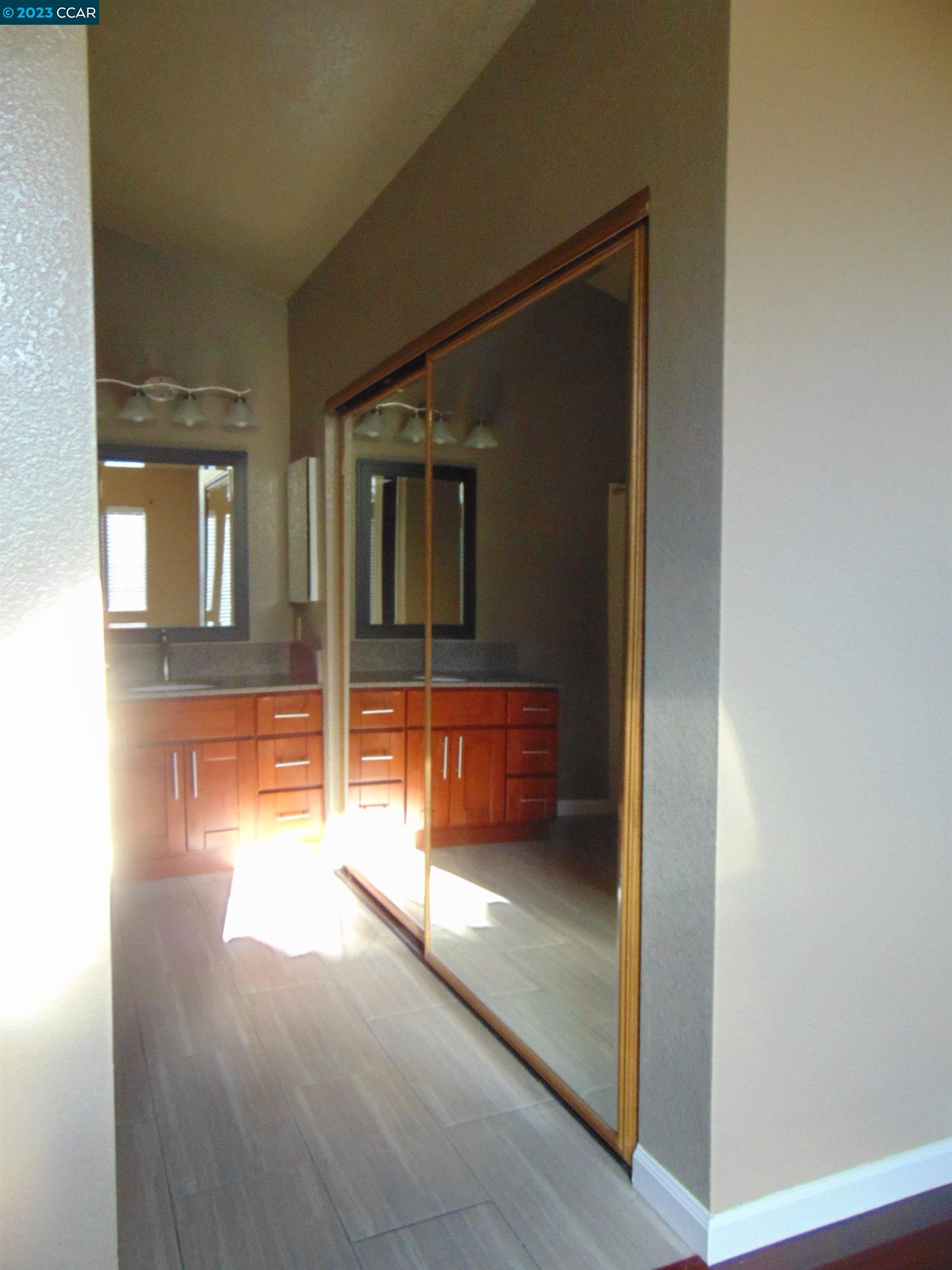 904 Devonwood Hercules, CA 94547 - Photo 13 of 18 a hallway with a view of living room