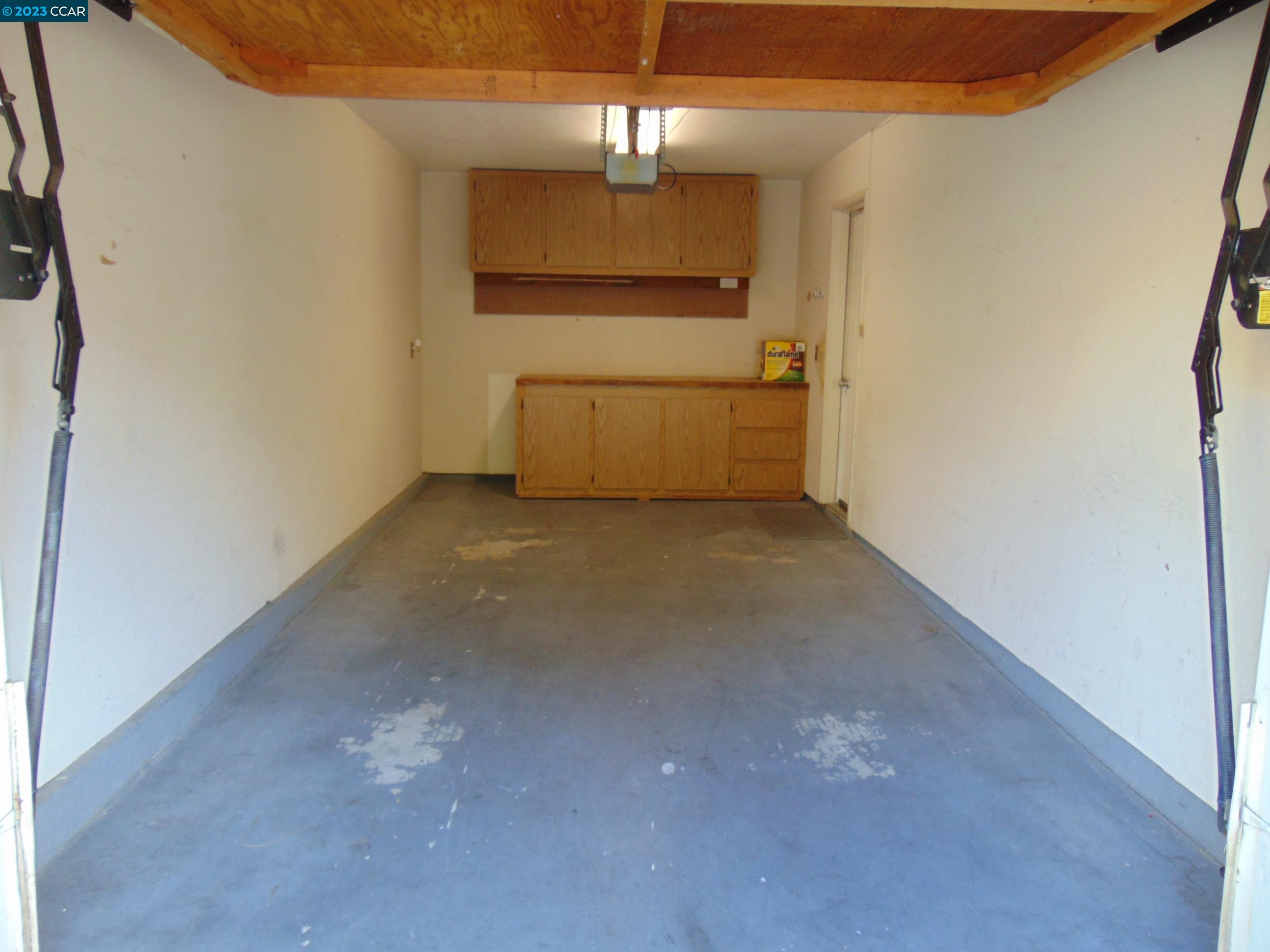 904 Devonwood Hercules, CA 94547 - Photo 7 of 18 a view of a refrigerator in a kitchen