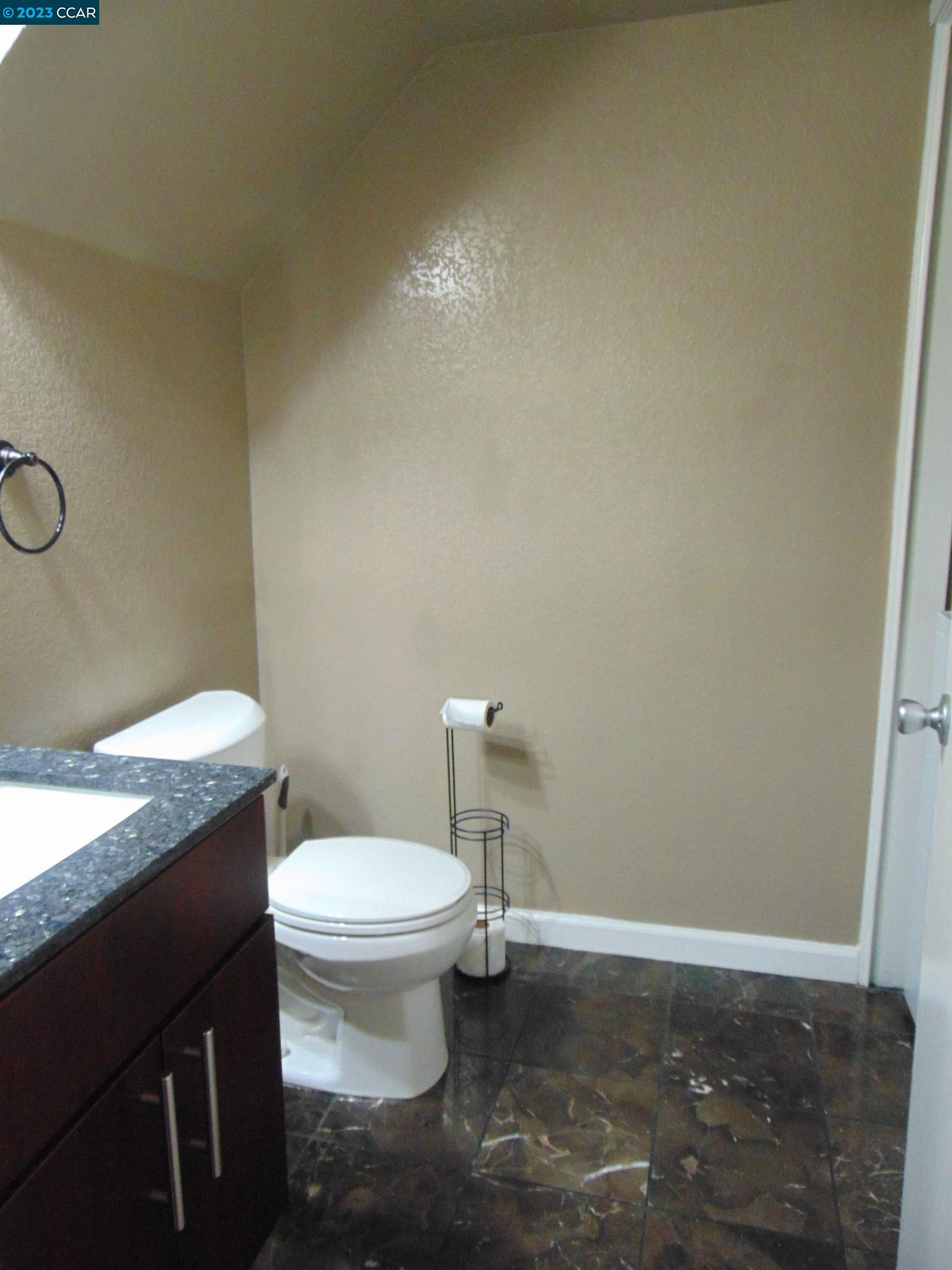 904 Devonwood Hercules, CA 94547 - Photo 8 of 18 a white toilet sitting next to a sink