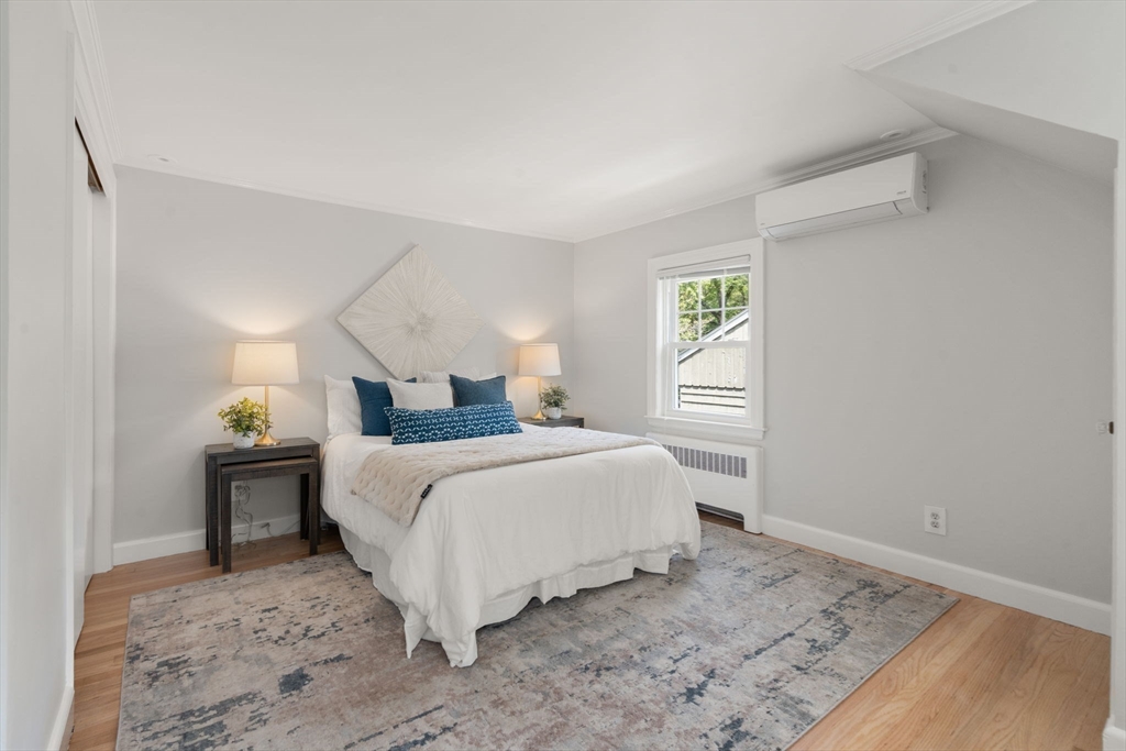 19 Conant Road Brookline, MA 02467 - Photo 12 of 18 a bedroom with a bed and a window