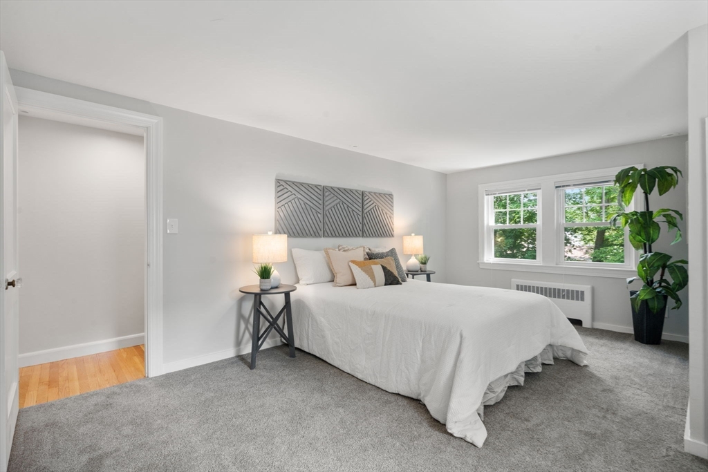 19 Conant Road Brookline, MA 02467 - Photo 13 of 18 a bedroom with a bed lamp and window