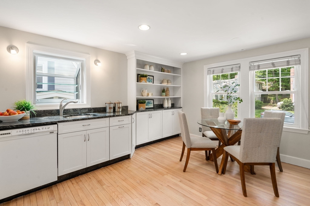 19 Conant Road Brookline, MA 02467 - Photo 6 of 18 a kitchen with granite countertop white cabinets and window