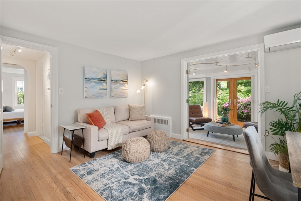 19 Conant Road Brookline, MA 02467 - Photo 7 of 18 a living room with furniture and a large window