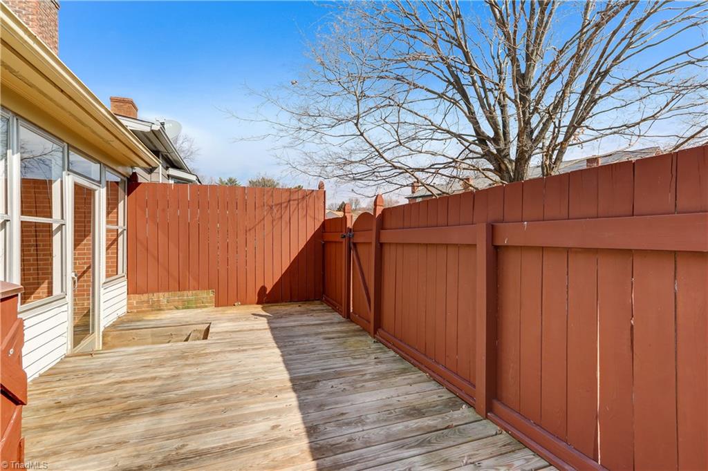 4901 Tower Road, Unit D Greensboro, NC 27410 - Photo 26 of 30 Deck and Privacy Fence