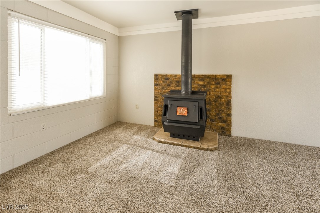 Undisclosed Address Las Vegas, NV 89107 - Photo 8 of 15 Interior details featuring a wood stove, ornamenta