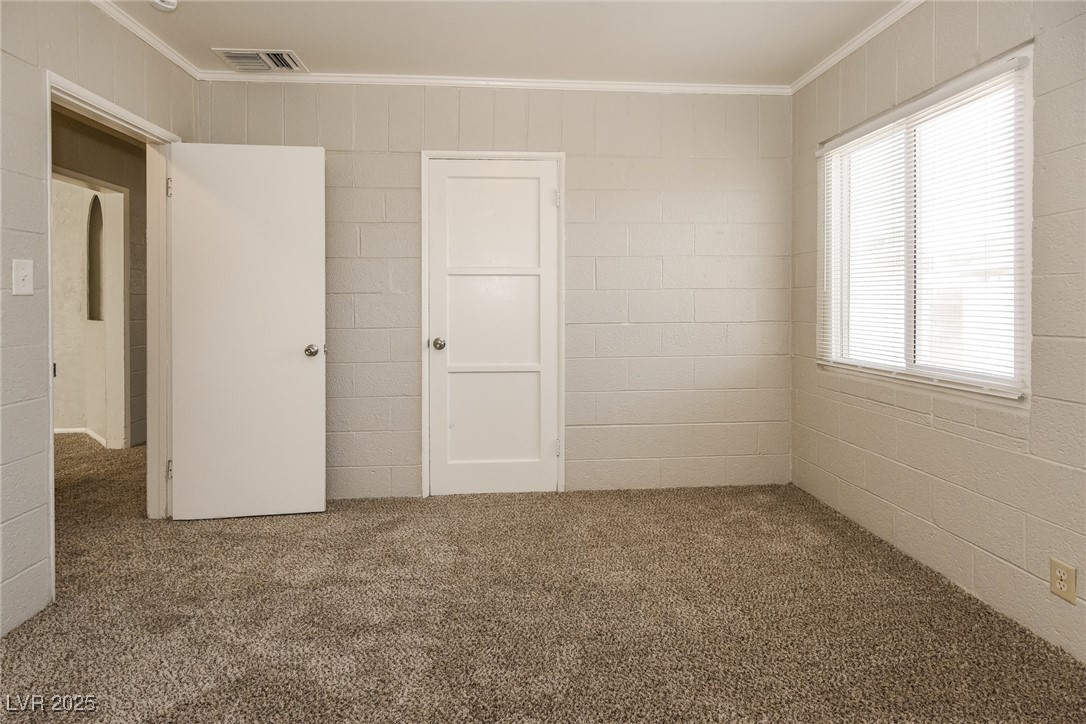 Undisclosed Address Las Vegas, NV 89107 - Photo 9 of 15 Unfurnished bedroom featuring carpet flooring, vis