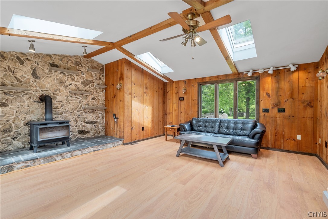 8069 Princess Path Clay, NY 13090 - Photo 21 of 50 The woodstove will keep you nice and warm on those