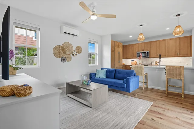 a living room with furniture and a window