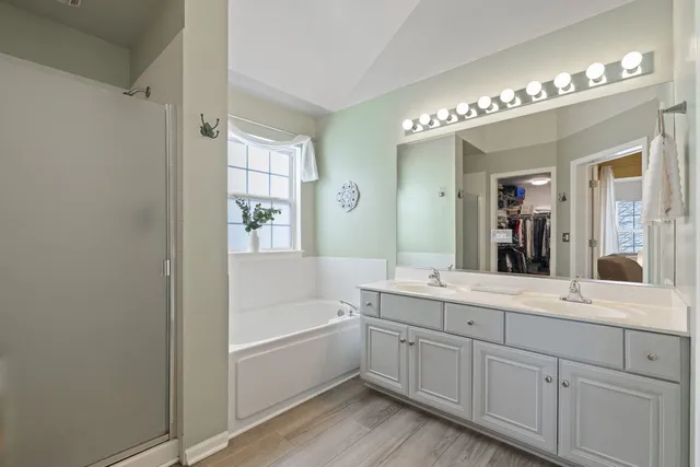 an aerial view of a residential houses with outdoor space