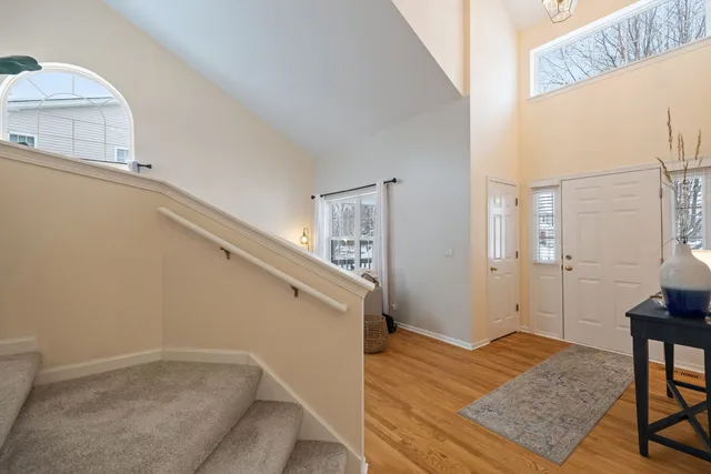 a aerial view of a house with a yard