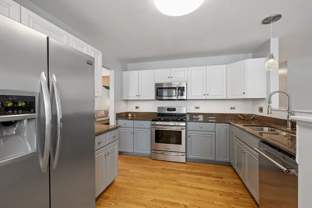 a view of a two chairs in the balcony