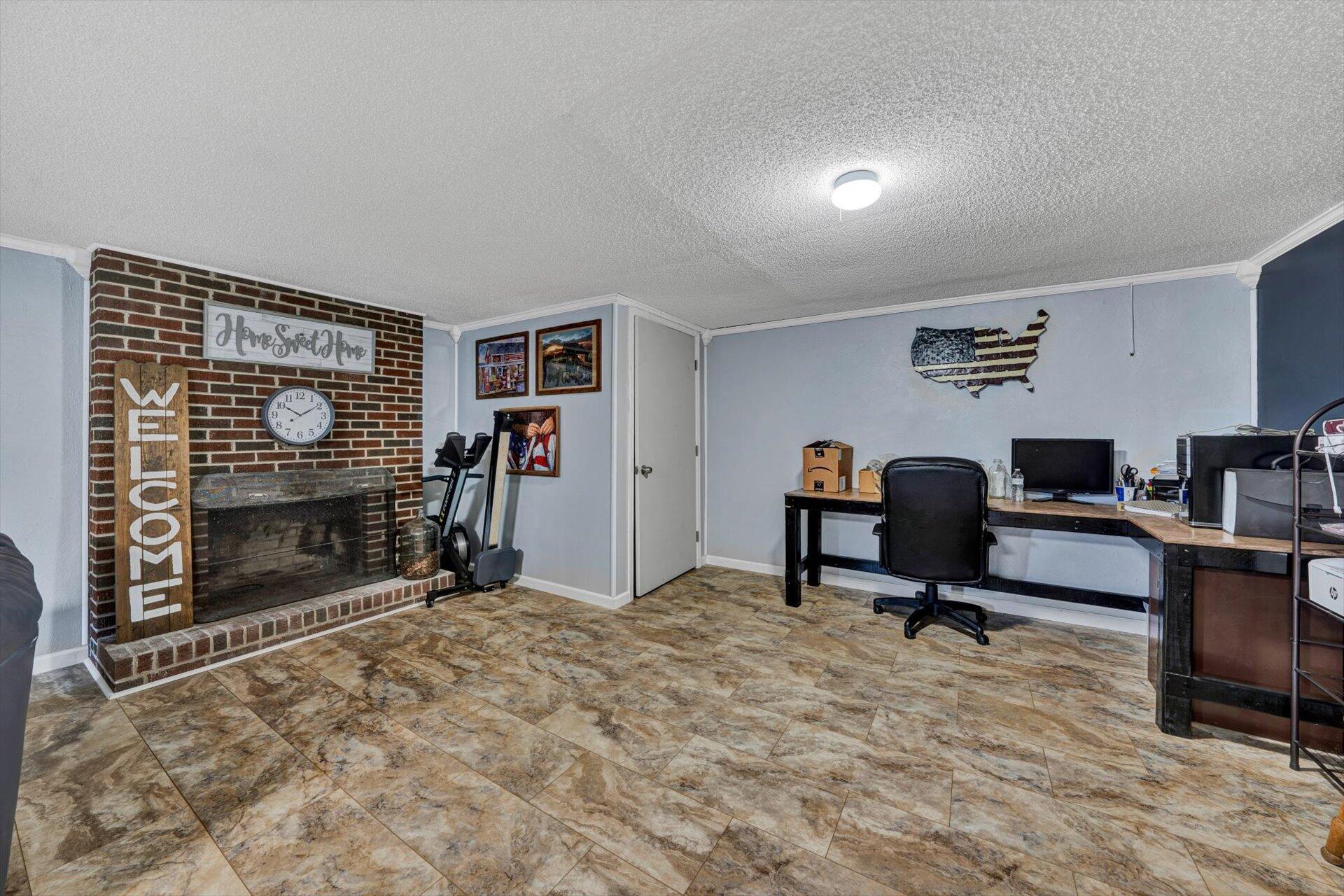 6203 Roberta Road Roanoke, VA 24019 - Photo 17 of 28 a view of a livingroom with workspace and a couch