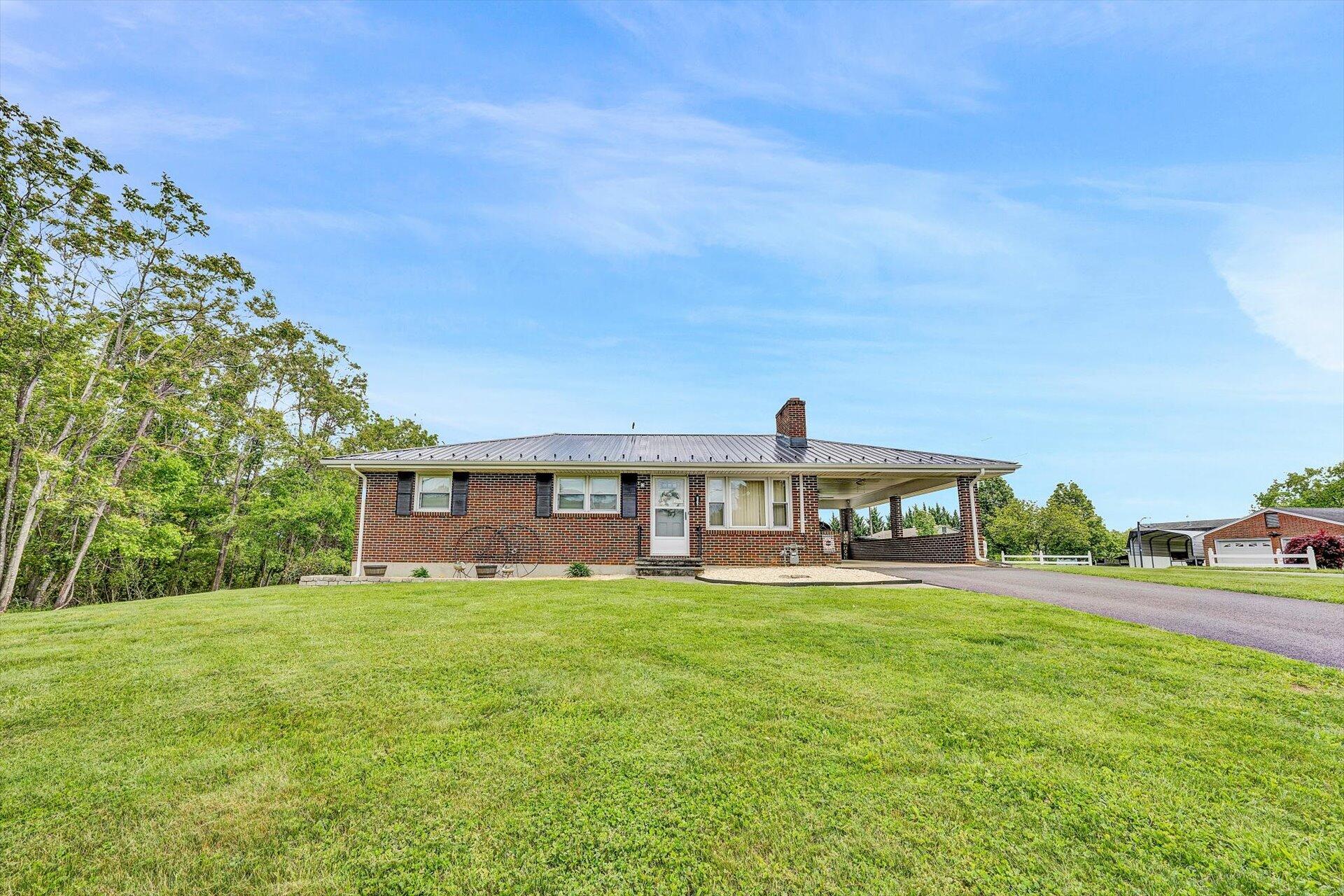 6203 Roberta Road Roanoke, VA 24019 - Photo 28 of 28 a large building with a garden