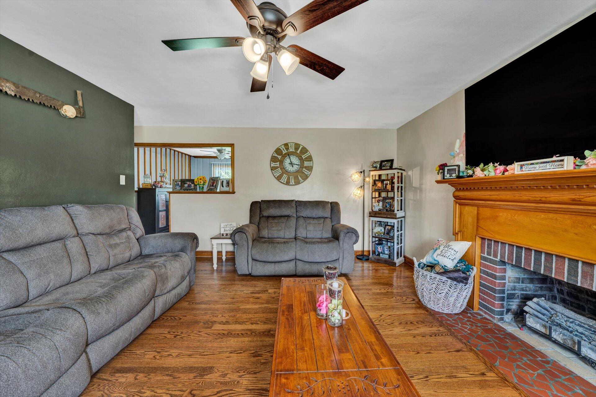 6203 Roberta Road Roanoke, VA 24019 - Photo 5 of 28 a living room with furniture and a flat screen tv